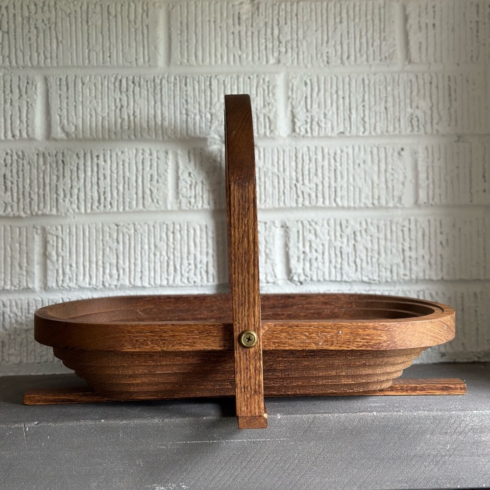 Vintage collapsable wooden bowl/basket.  13”L x 6”W x 9” H